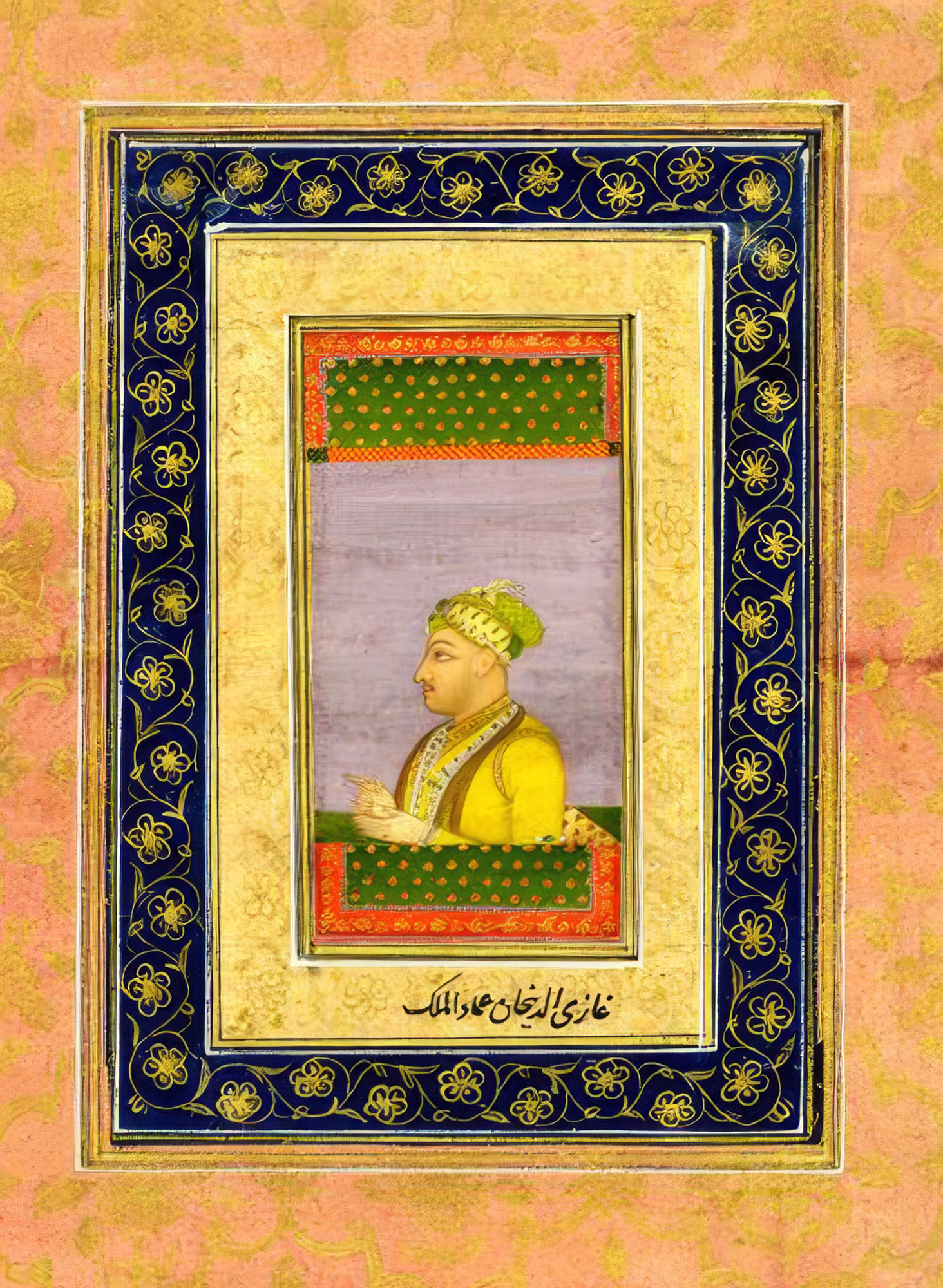 A painting showing a man in profile wearing a yellow robe and jeweled turban, set against a pale background. The portrait is framed with ornate gold and blue floral borders.