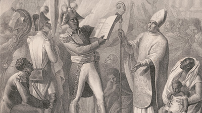Print shows a Haitian military officer, holding a printed copy of the Constitution of 1801, standing opposite a bishop appealing to an image of God or Moses in the heavens, with other Haitians and soldiers gathered around