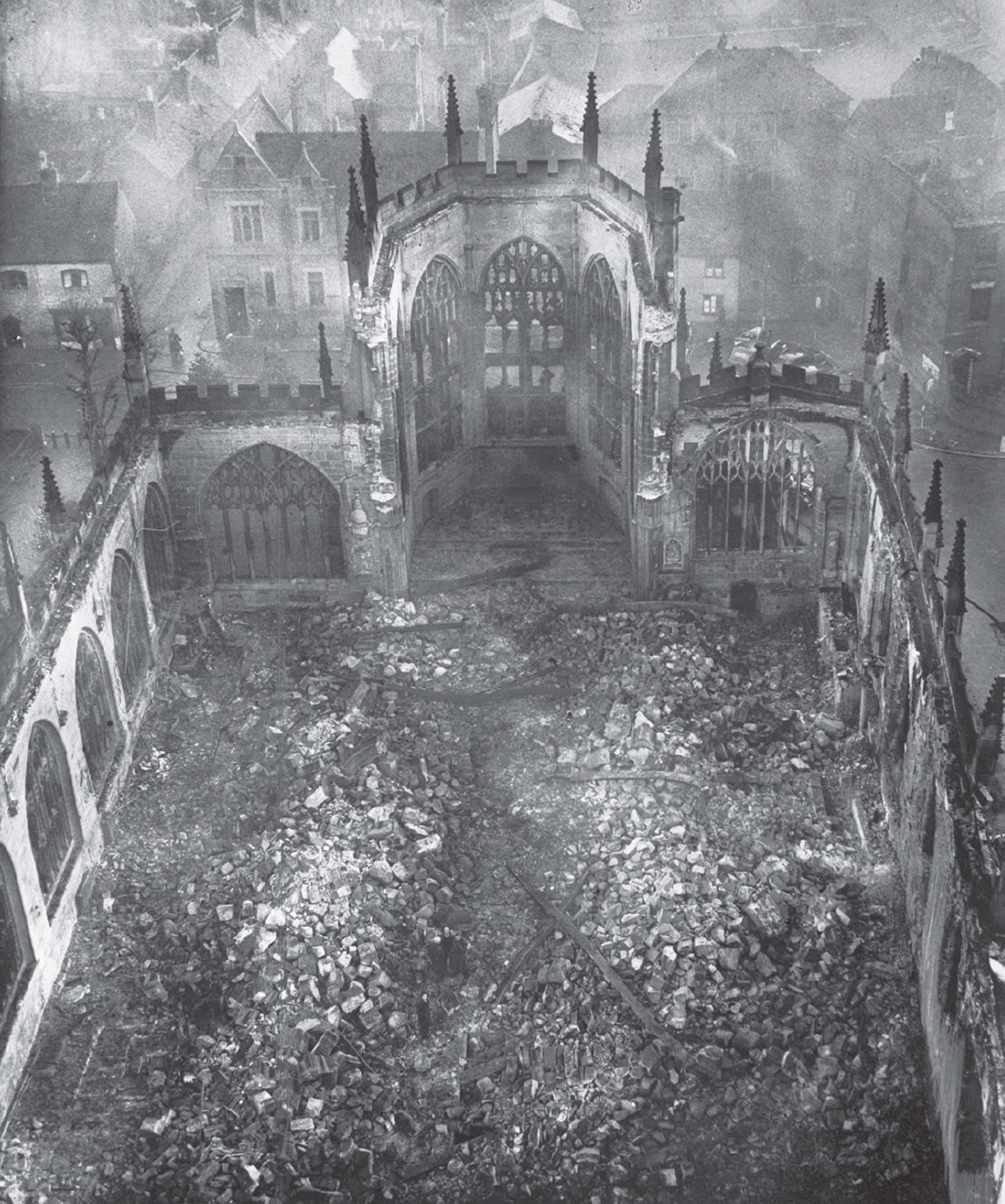 Ruins of a still smoldering church in England after a night blitz.