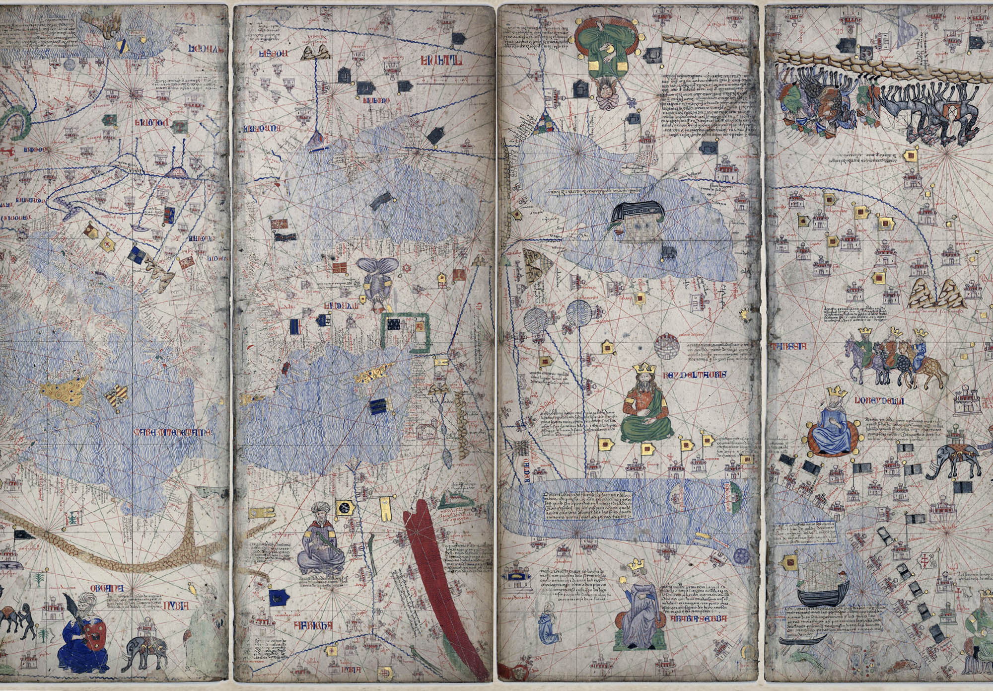 Panels from a Catalan Atlas illustrate the caravan trade routes using lines and descriptions. The atlas is extremely detailed and contains ornate and colorful illustrations throughout of leaders, buildings, animals, features of the landscape and so on.