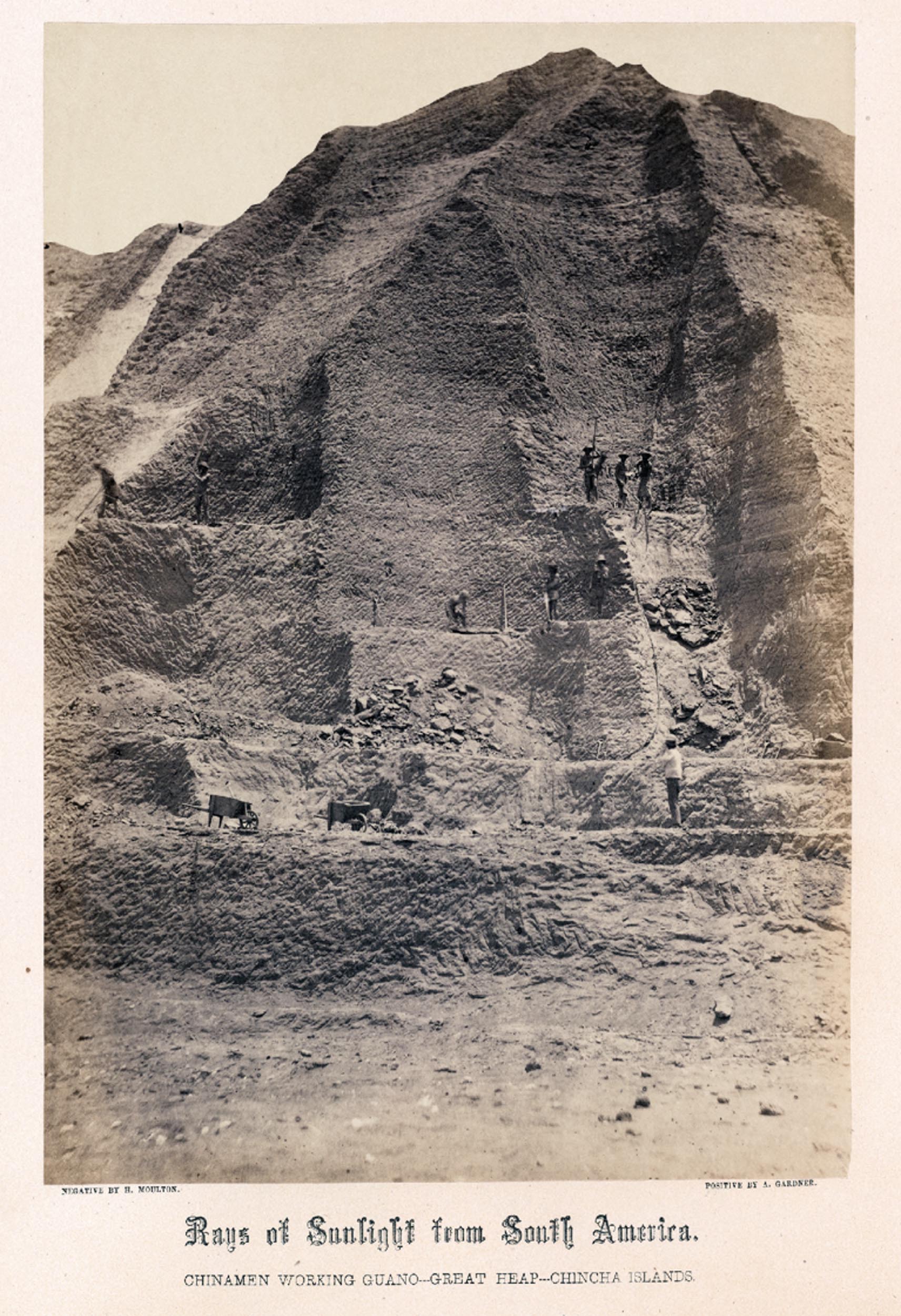 An image from the series, Guano mines in Peru: workers dig out and move material from the "Great Heap."