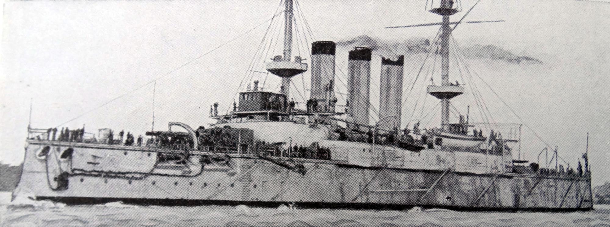 Panoramic photo of the Japanese battleship Shikishima under steam.