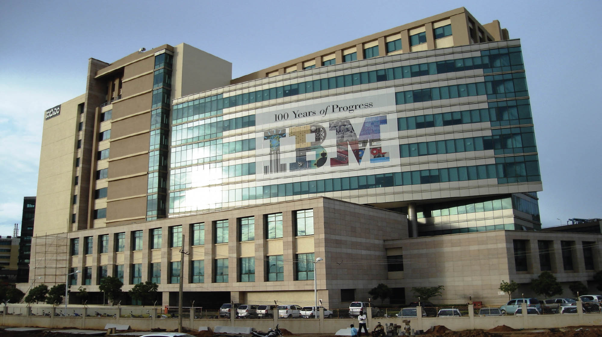 A modern office building with the logo for IBM prominently displayed.