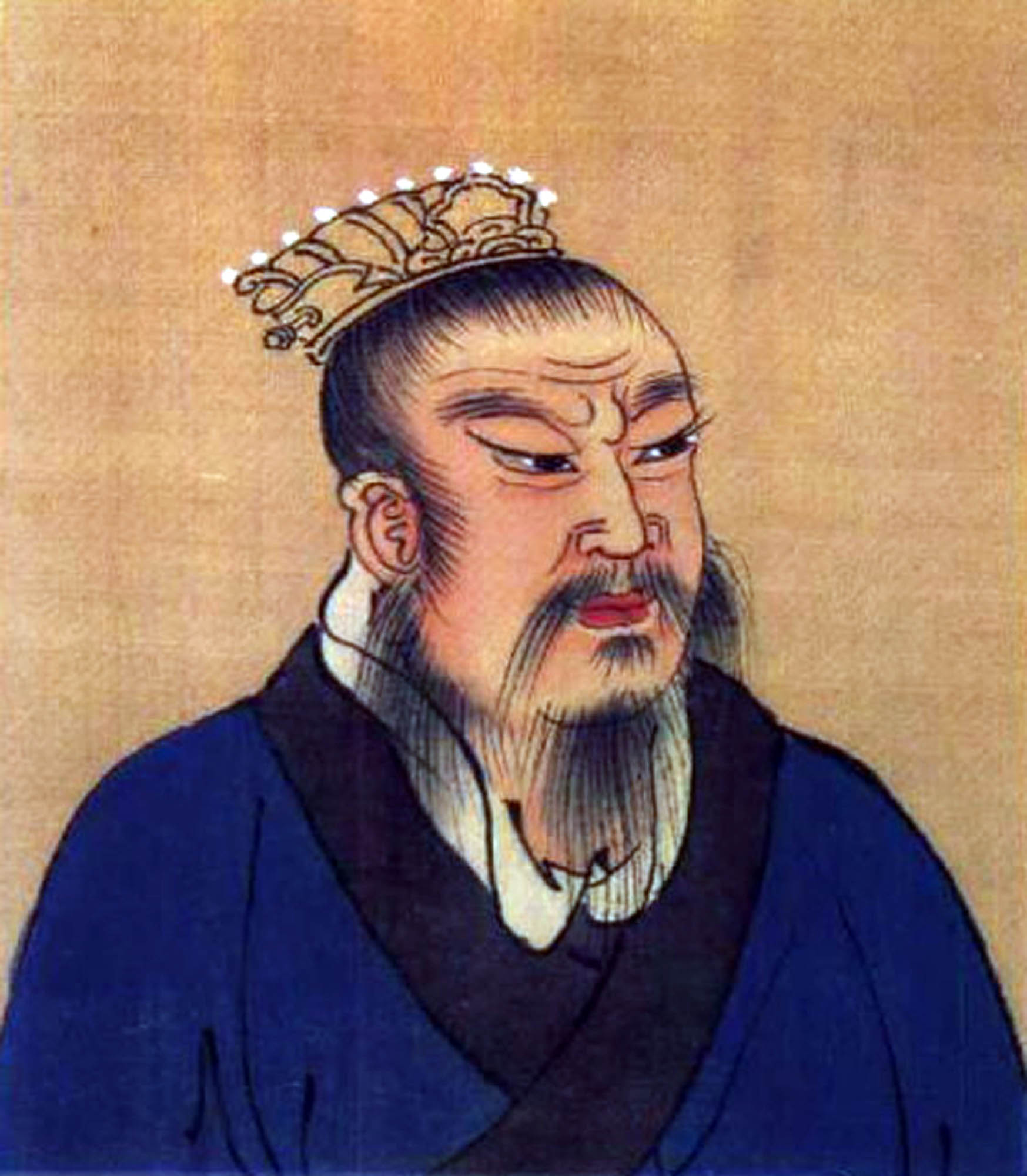 Portrait of Emperor Liu Bang with a crown on his head, a long beard, and a dark-colored robe.