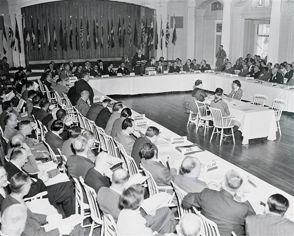 The modern system of economic globalization was largely created at the Bretton Woods Conference in 1944. © Bettmann / Getty Images.