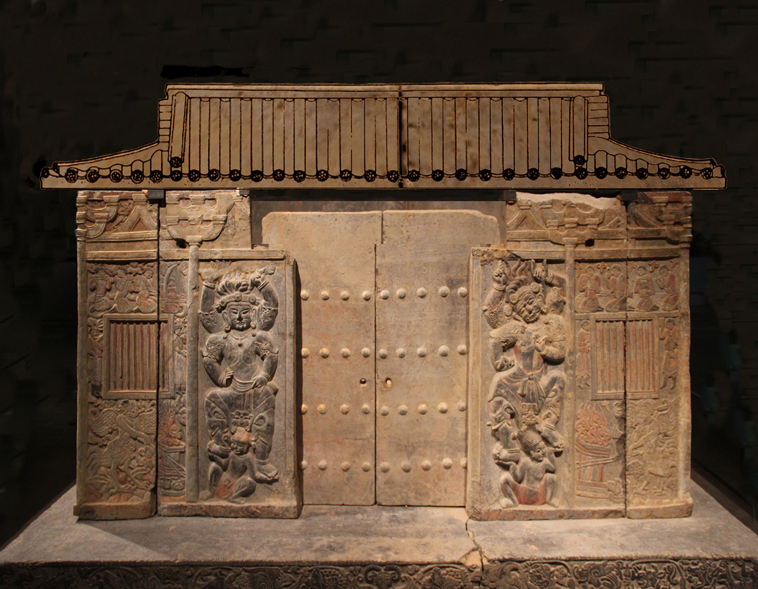 An elaborately carved stone sarcophagus.