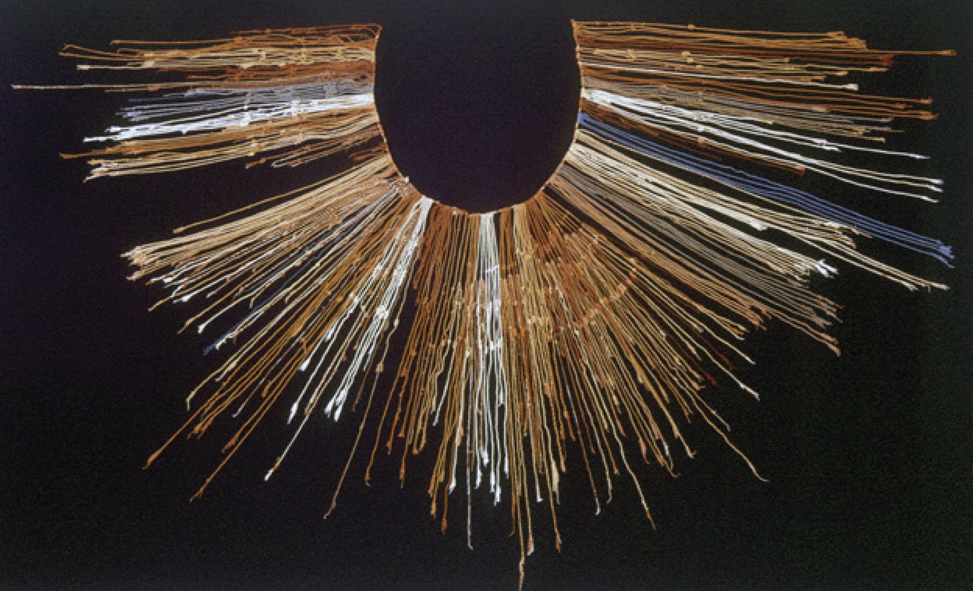 A quipu on display. A quipu is a recording system using knots and strings used by a number of cultures in the region of Andean South America.