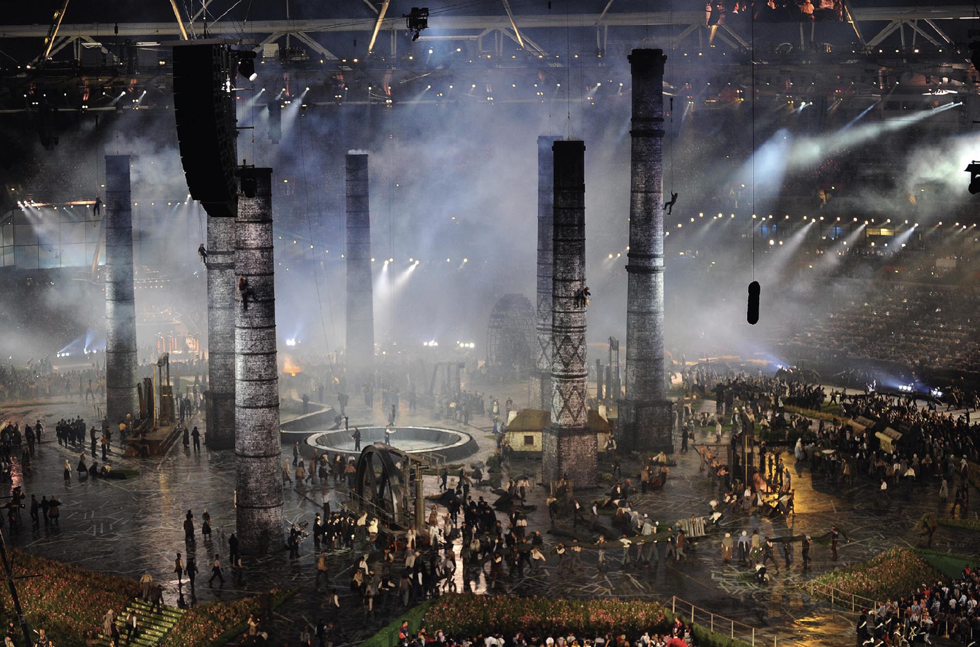 Dramatic scene at the opening ceremony of the London Olympics in 2012 telling the story of Great Britain and the Industrial Revolution. 