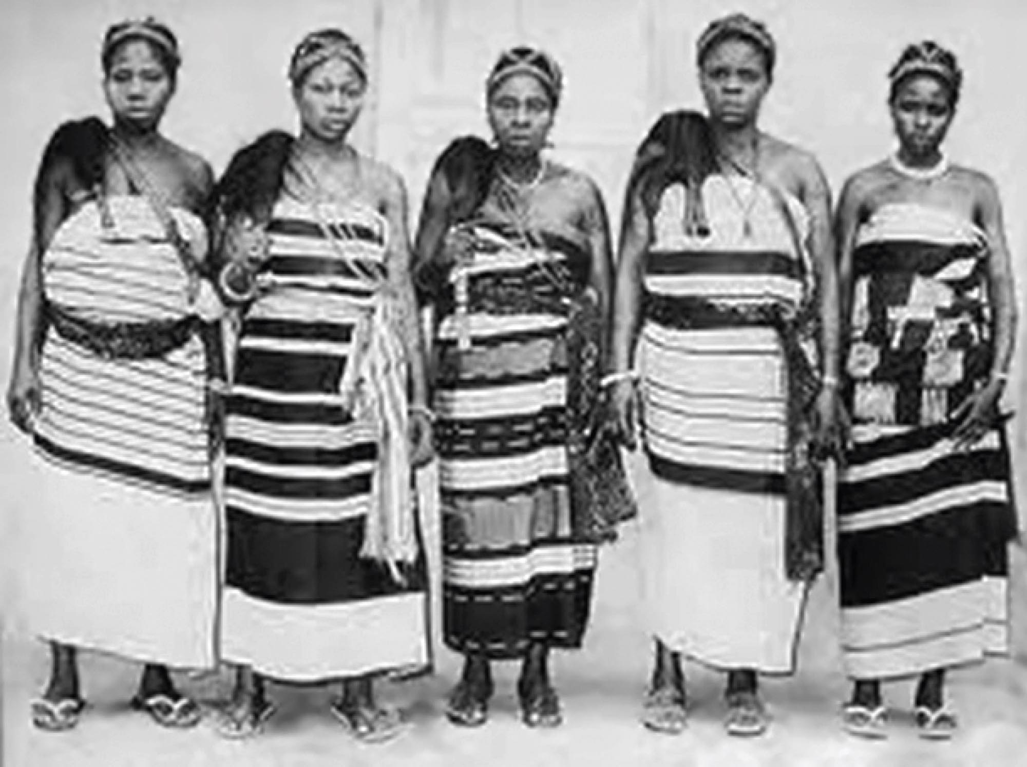 Photograph of five Igbo women of Nigeria wearing traditional dress.