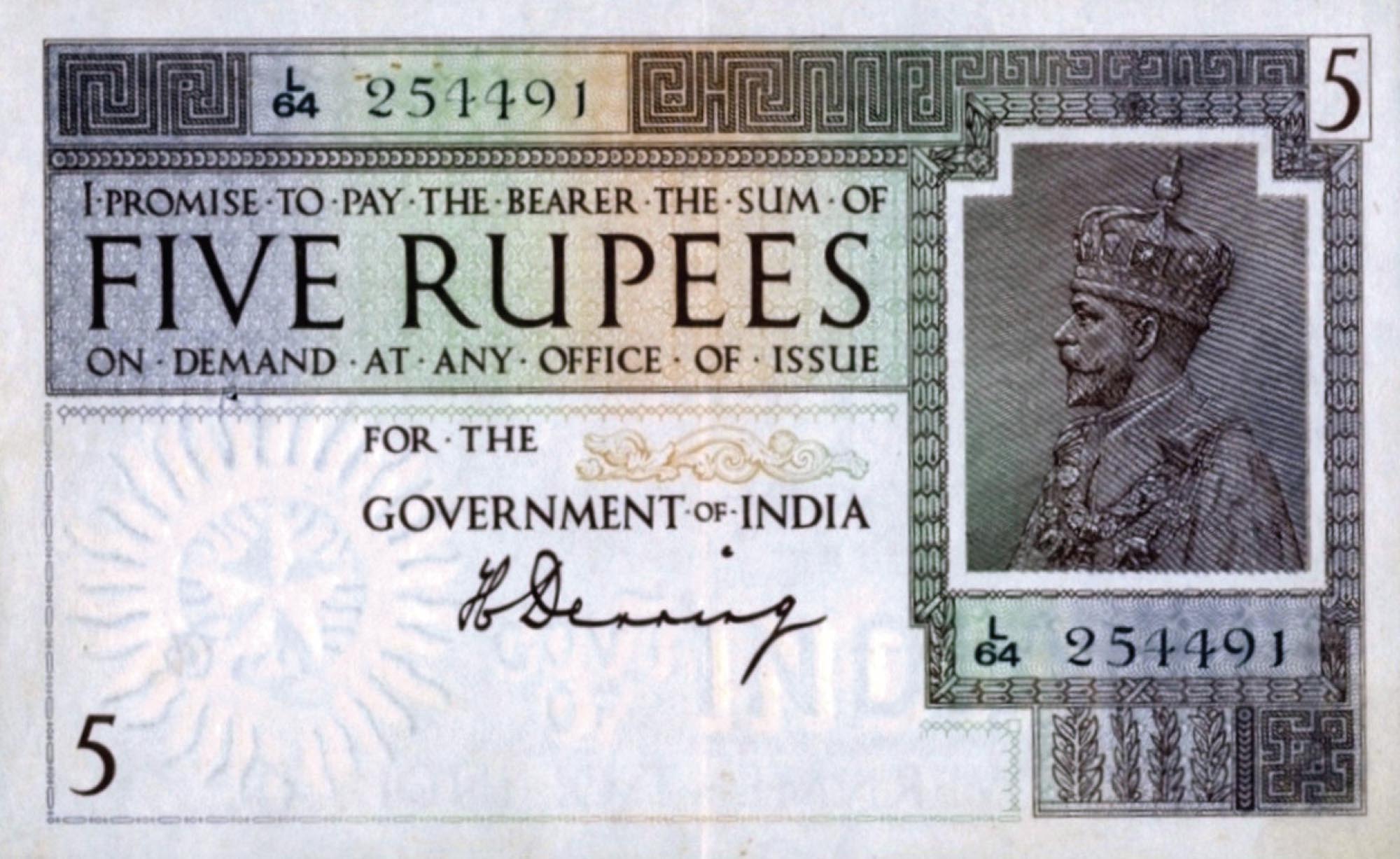 An Indian five-rupee note featuring the likeness of King George V.