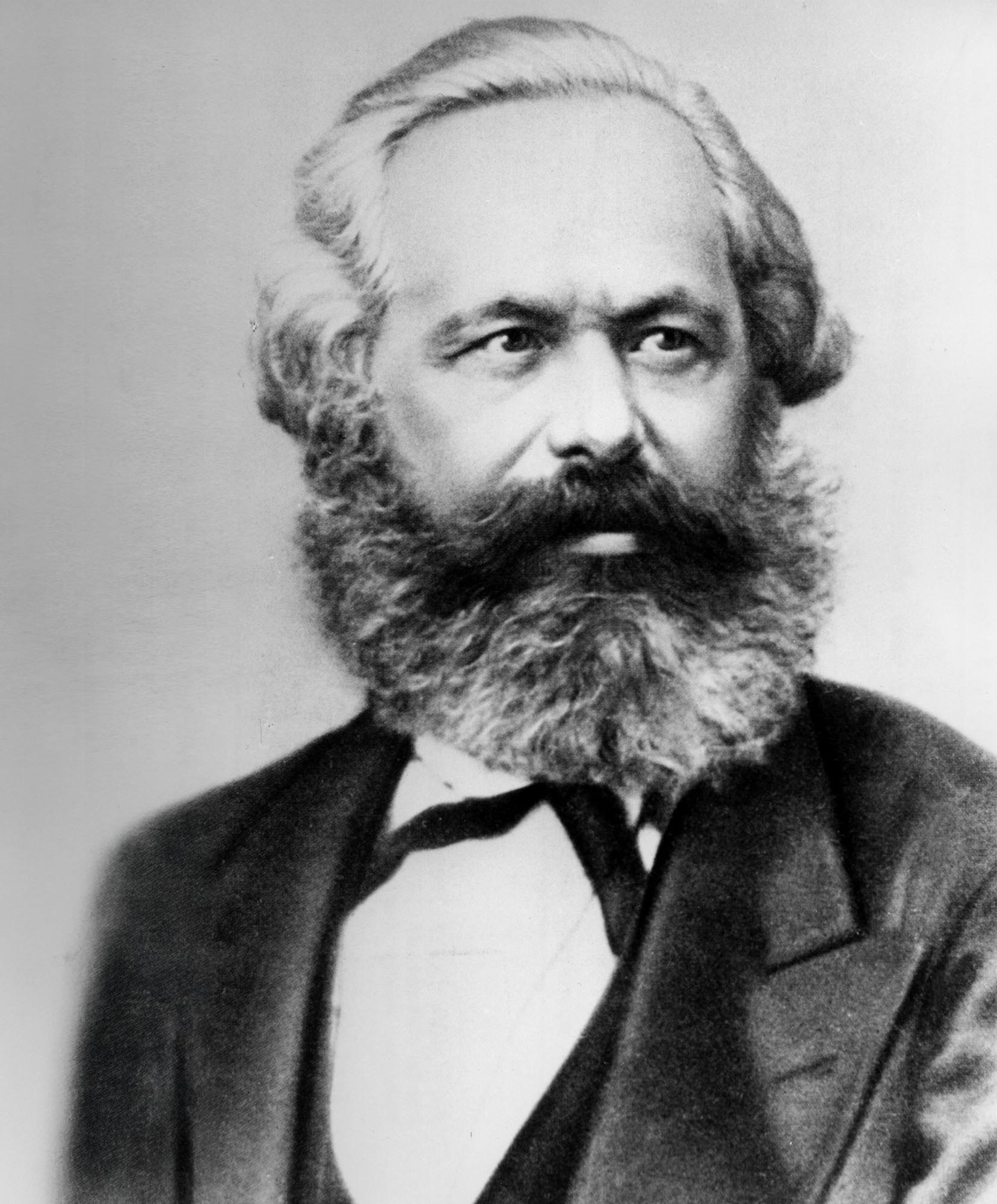 Photographic portrait of Karl Marx with his characteristic big bushy beard.