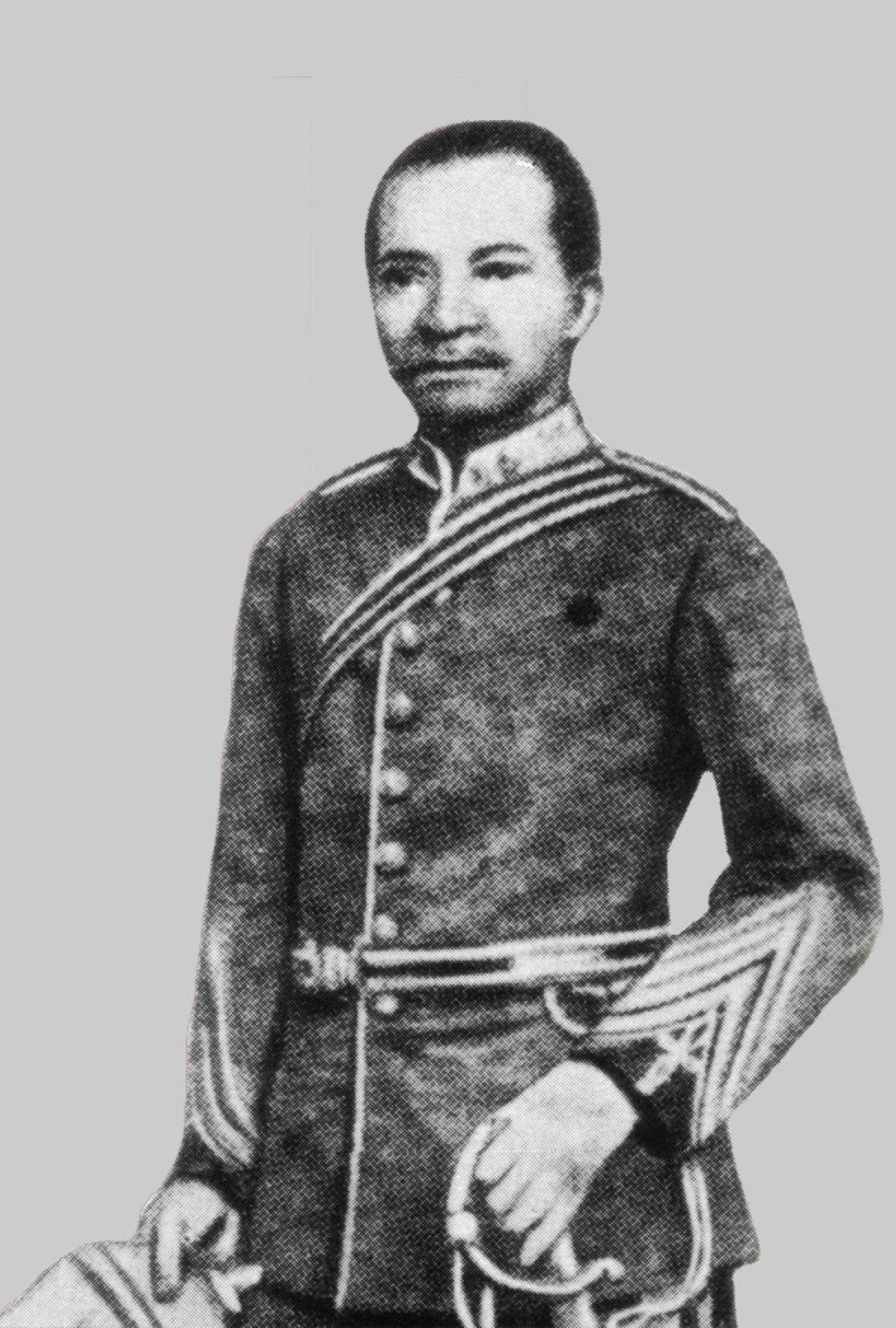 Photo of British soldier, James Africanus Horton. Horton is wearing a traditional military uniform and carrying a sword.