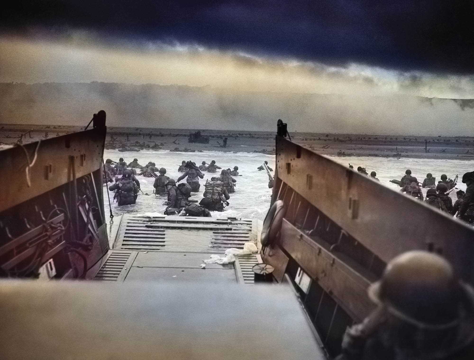 Painting of soldiers wading to shore after having been dropped by their ship. The ship would not have been able to get any closer without running aground.   