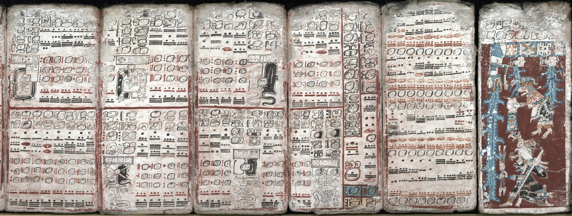 A paneled, painted manuscript featuring language symbols and detailed art.