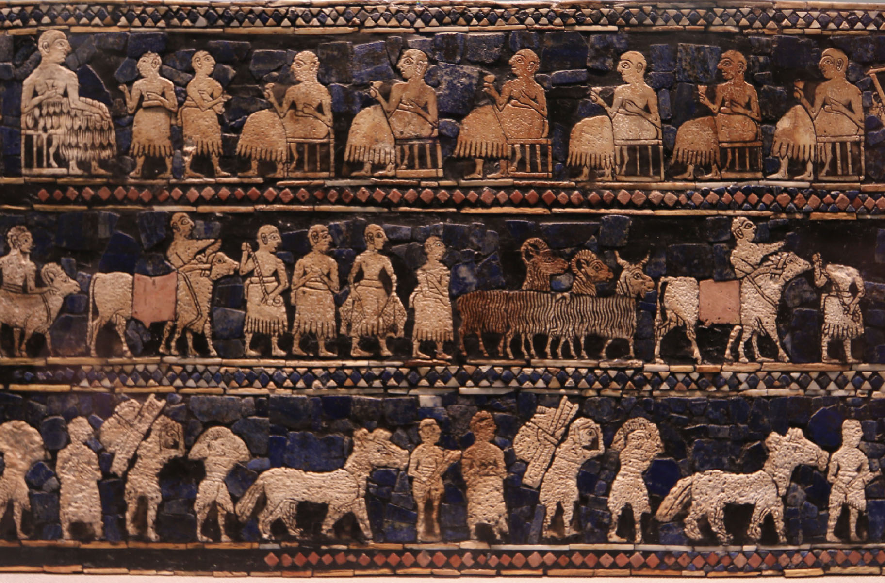 Paneled artwork depicting a journey. There are domesticated animals and people carrying large packs.