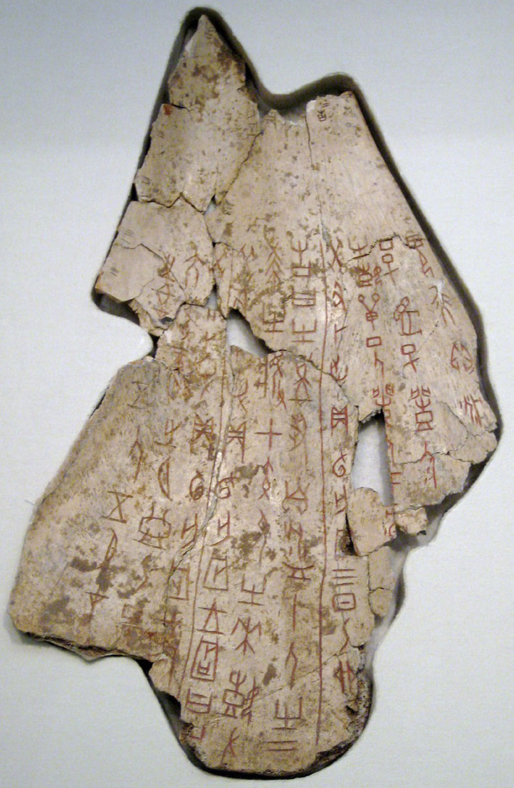 A slab of bone features drawn-on symbols