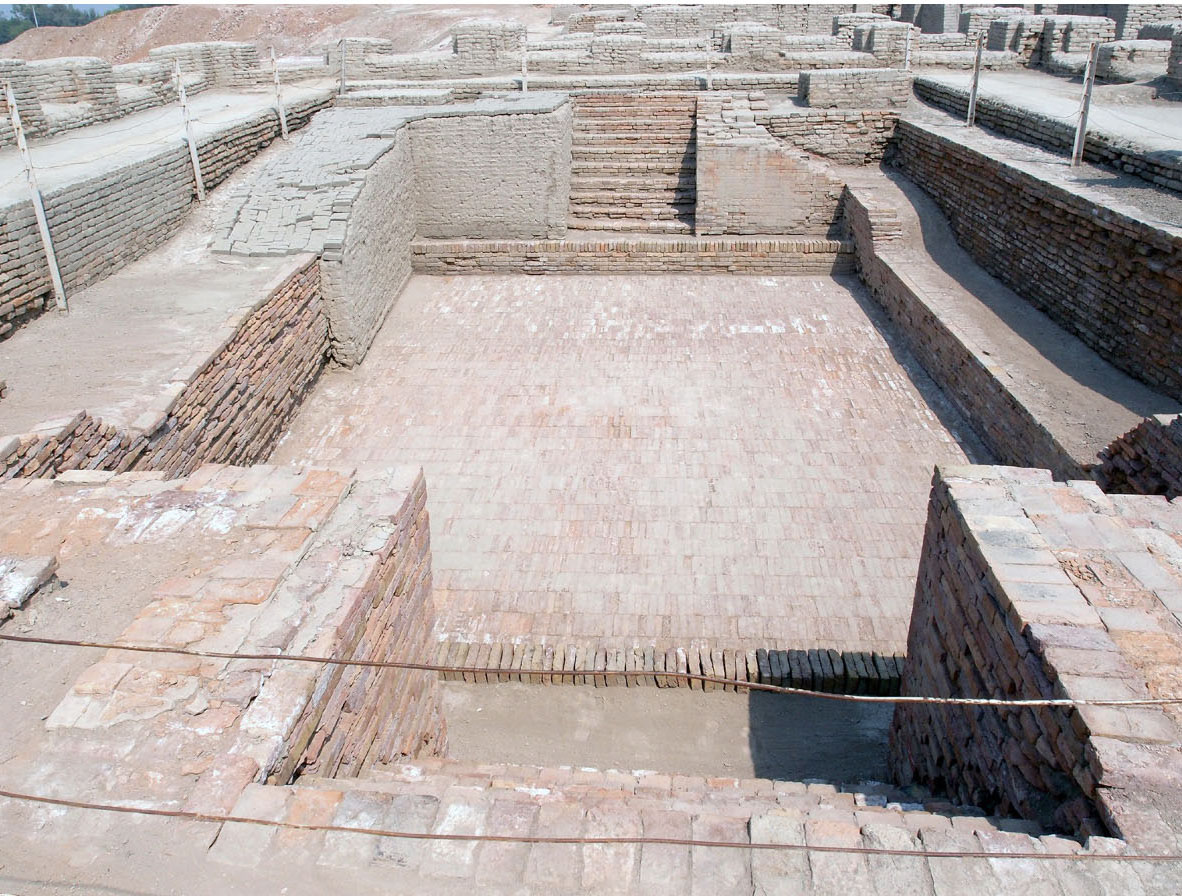 A photo of an empty pool made of brick
