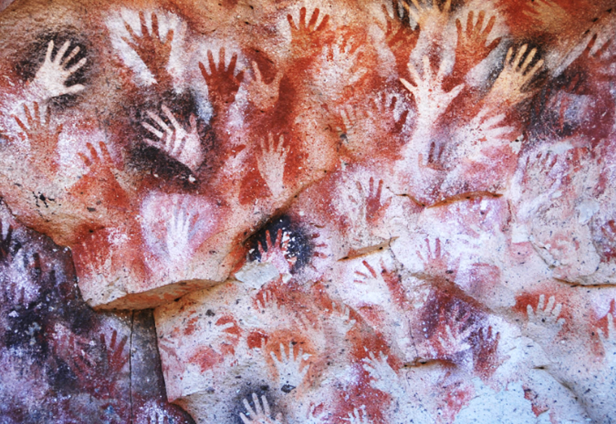Close-up of handprints on a rock at Cueva de las Manos.