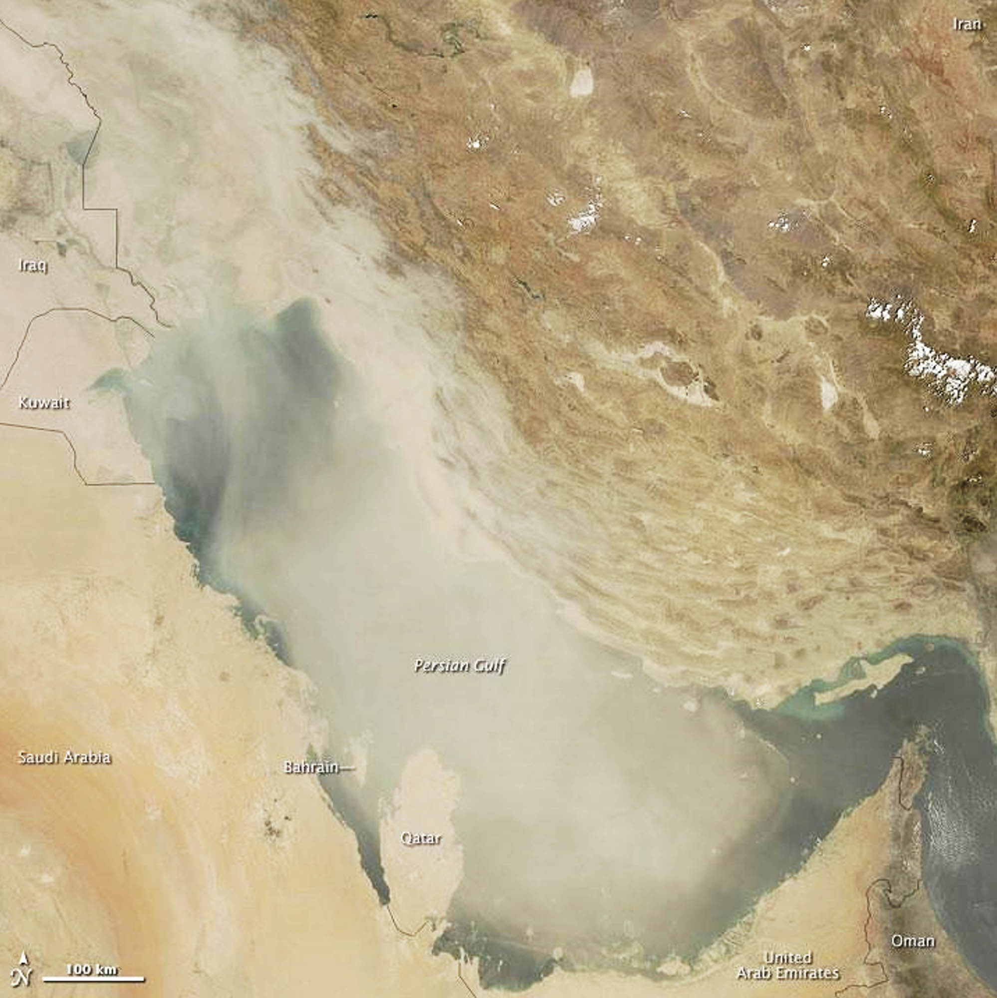 Photo shows an immense cloud of dust covering the Persian Gulf.