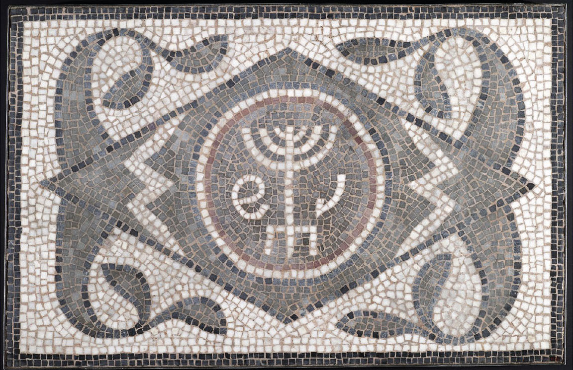 A grey, white, and red mosaic shows a menorah, a candelabrum used for worship, along with two of the plants used to observe the Jewish holiday of Sukkot.