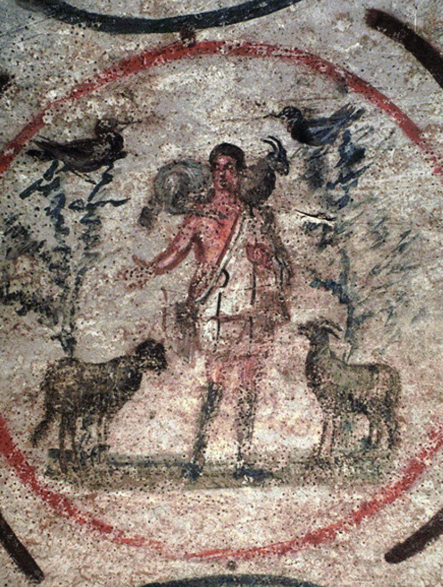 Painting of Jesus with sheep on either side of him, as well as one resting on his shoulders.