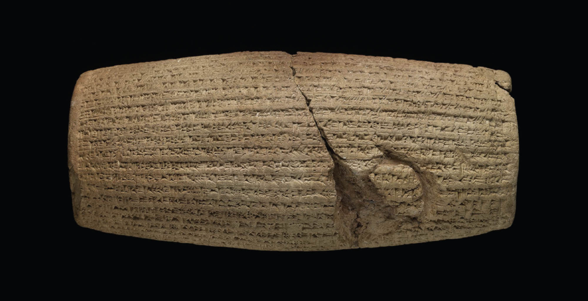 Barrel-shaped clay cylinder known as the Cyrus Cylinder showing wear. The Cyrus Cylinder displays writing that represents a Babylonian account of the conquest of Babylon by Cyrus in 539 BC.