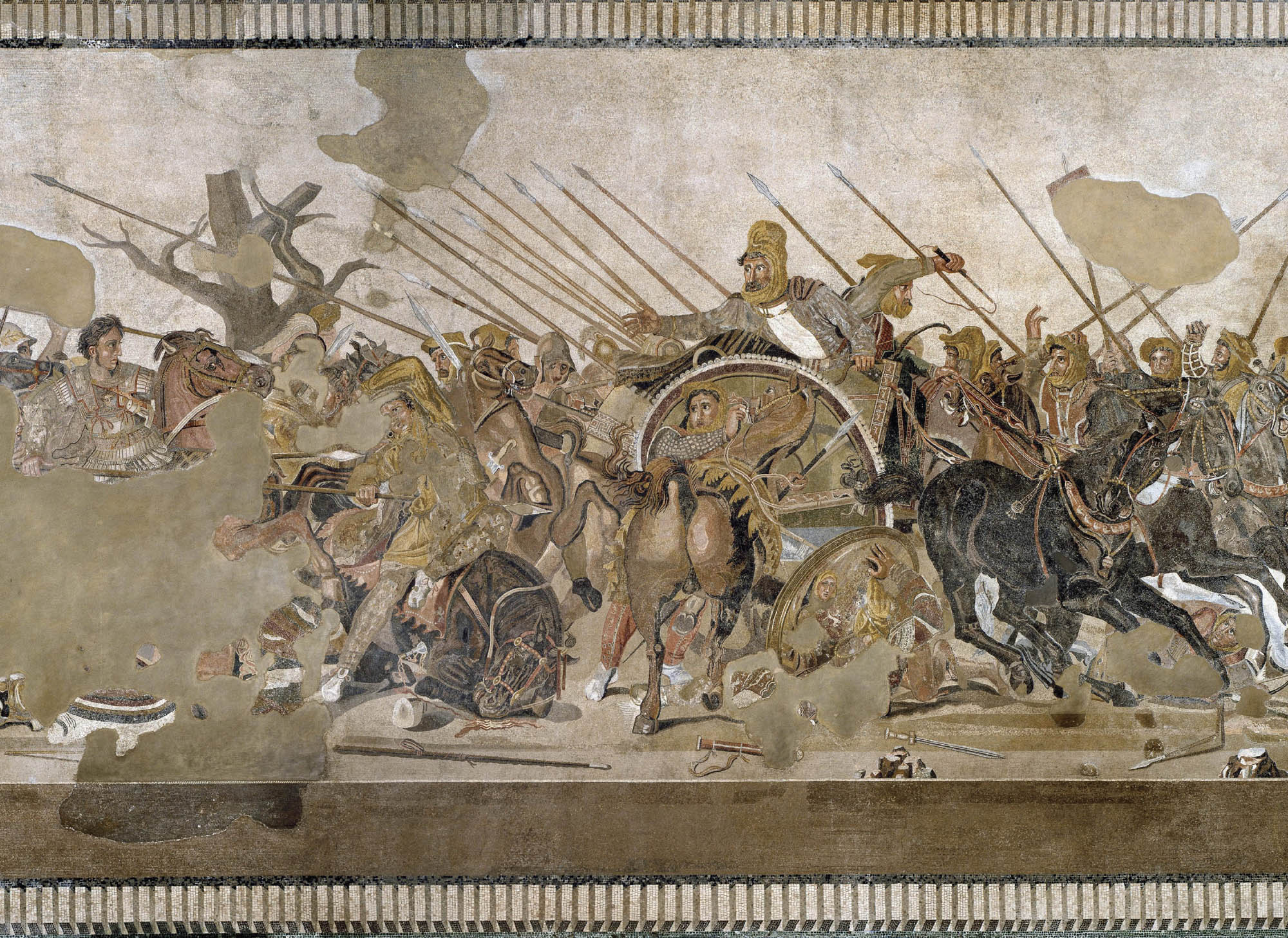 Extremely detailed mosaic depicts a bloody and violent battle. Men on horseback, carrying spears, race forward, trampling people in their wake.