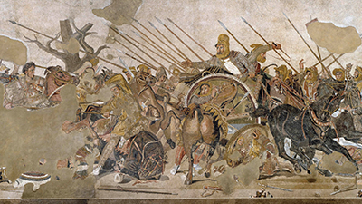 Extremely detailed mosaic depicts a bloody and violent battle. Men on horseback, carrying spears, race forward, trampling people in their wake.