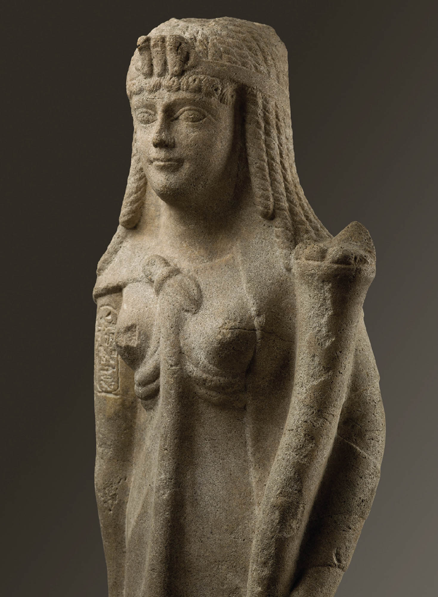 A stone statue of a Ptolemaic queen.