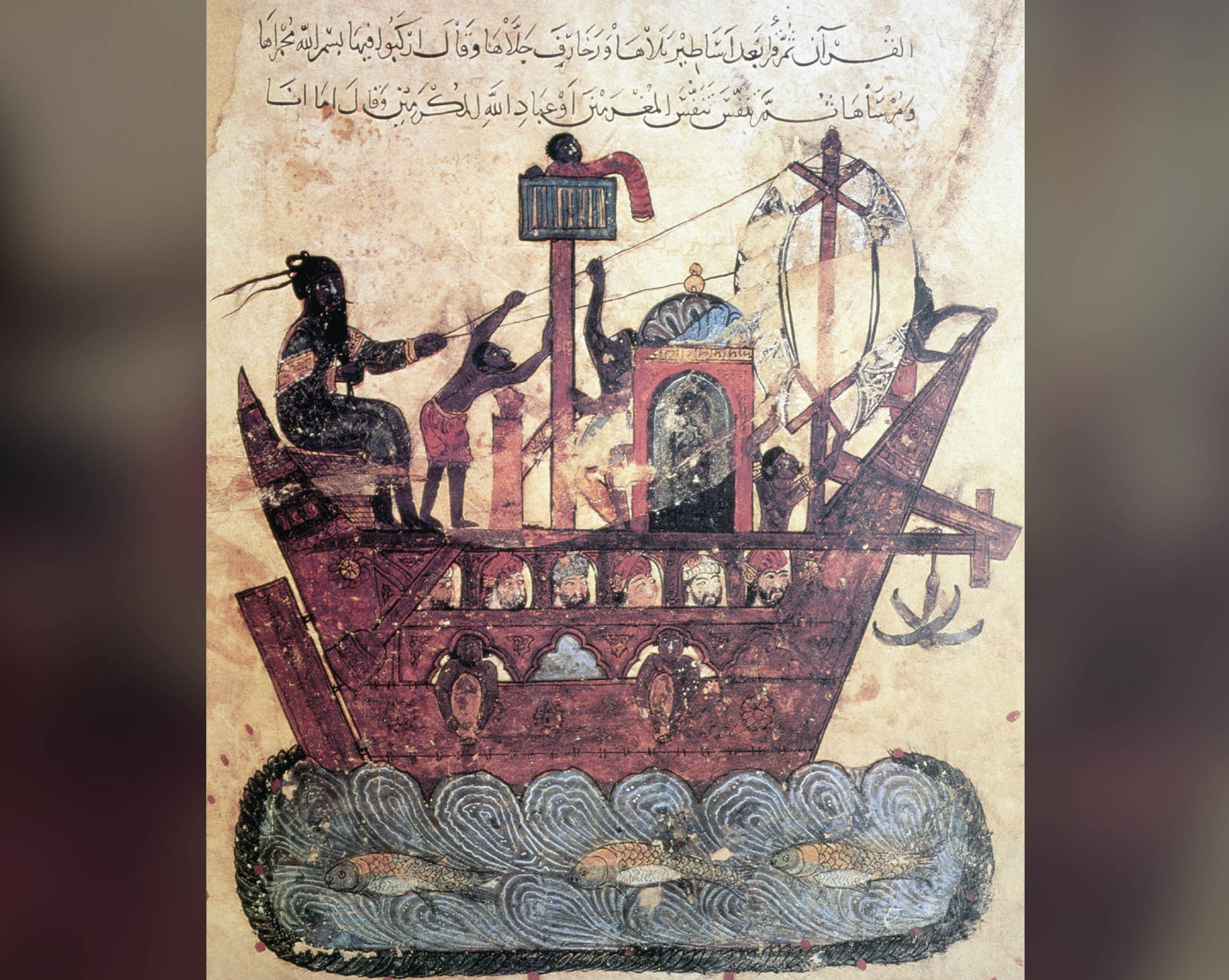 A weathered illustration of a sailing vessel with people looking out through the windows below deck while several people above deck are working to steer and manage the sail. The boat sits on top of blue waves of water with three large fish within it.