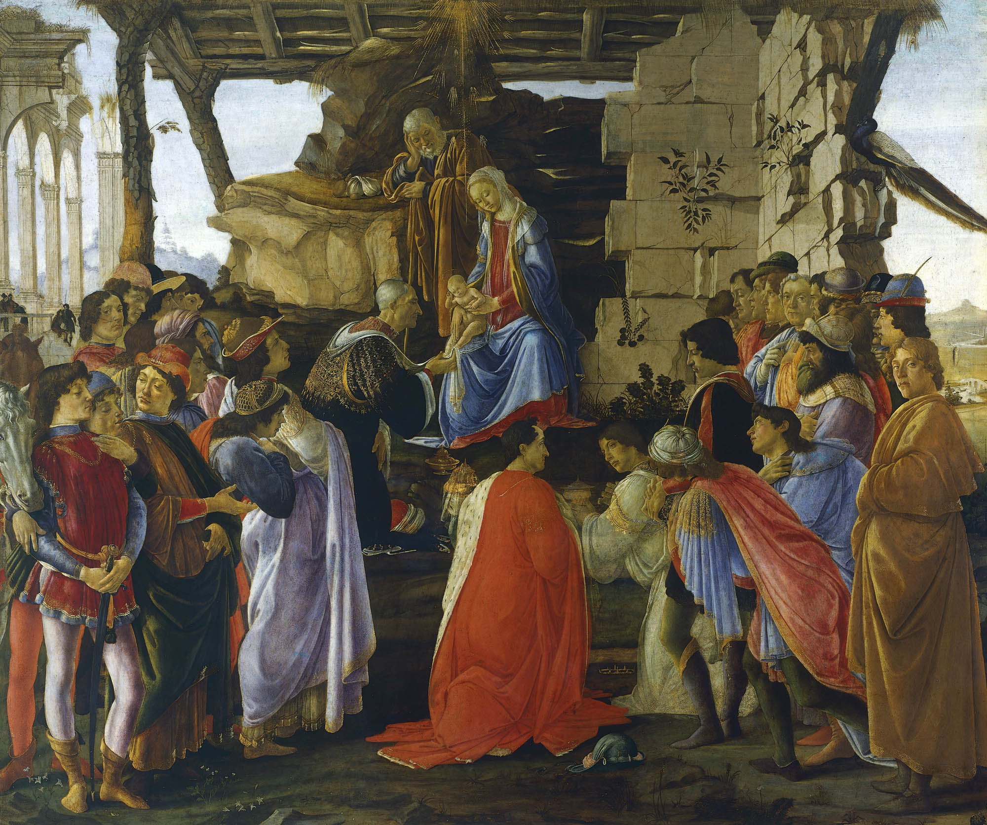 A painting of a religious scene from the bible. With portraits of several members of the family that paid for the painting.