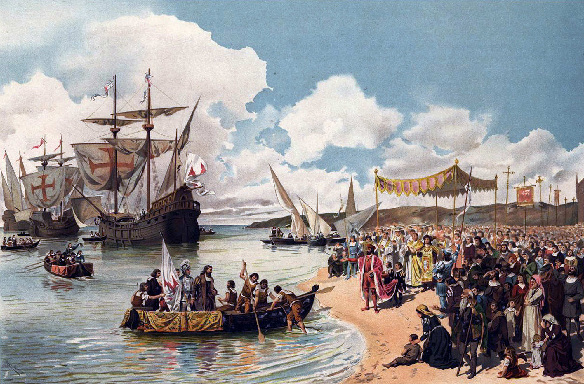 Illustration of da Gama's arrival in India. On the left is several small boats full of people leaving the ships they arrived on. On the right is a large group of people on a beach.