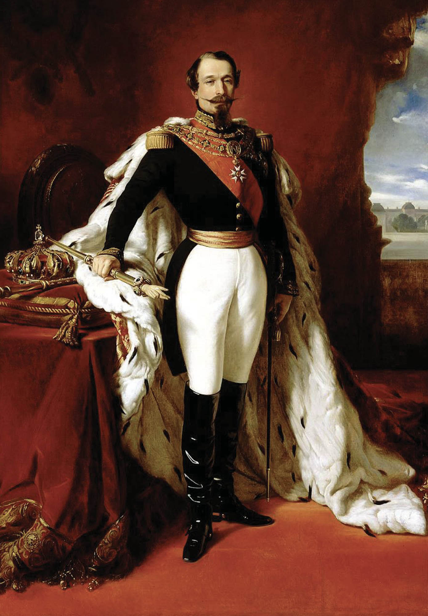 A full-length portrait of Napoleon III in regal attire wearing a black military-style coat with gold embellishments, white breeches, tall black boots, a red sash with a white cross adorns his chest, and a white fur-lined cloak is draped over his shoulders.