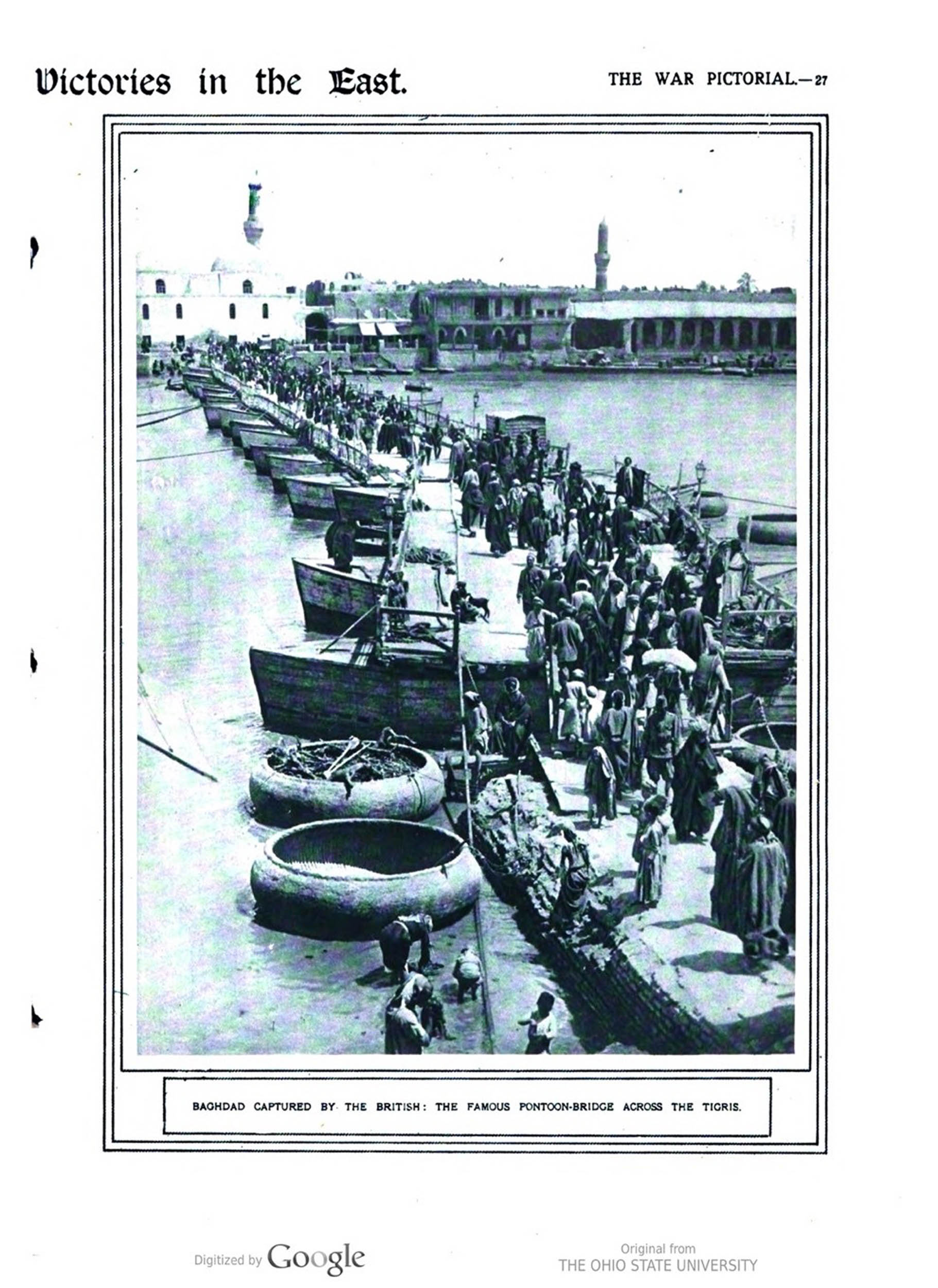 Crowds of people crossing a pontoon bridge made of boats over a river, with buildings visible in the background.