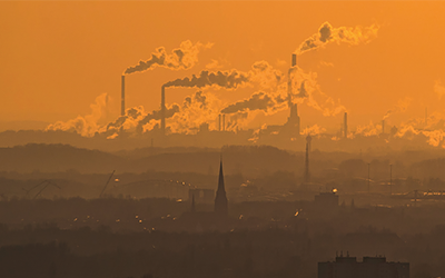 Steam and exhaust rise from different companies on a cold winter day in Oberhausen, Germany